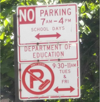 No parking School Days Sign with Department of Education sign and Street Cleaning Sign